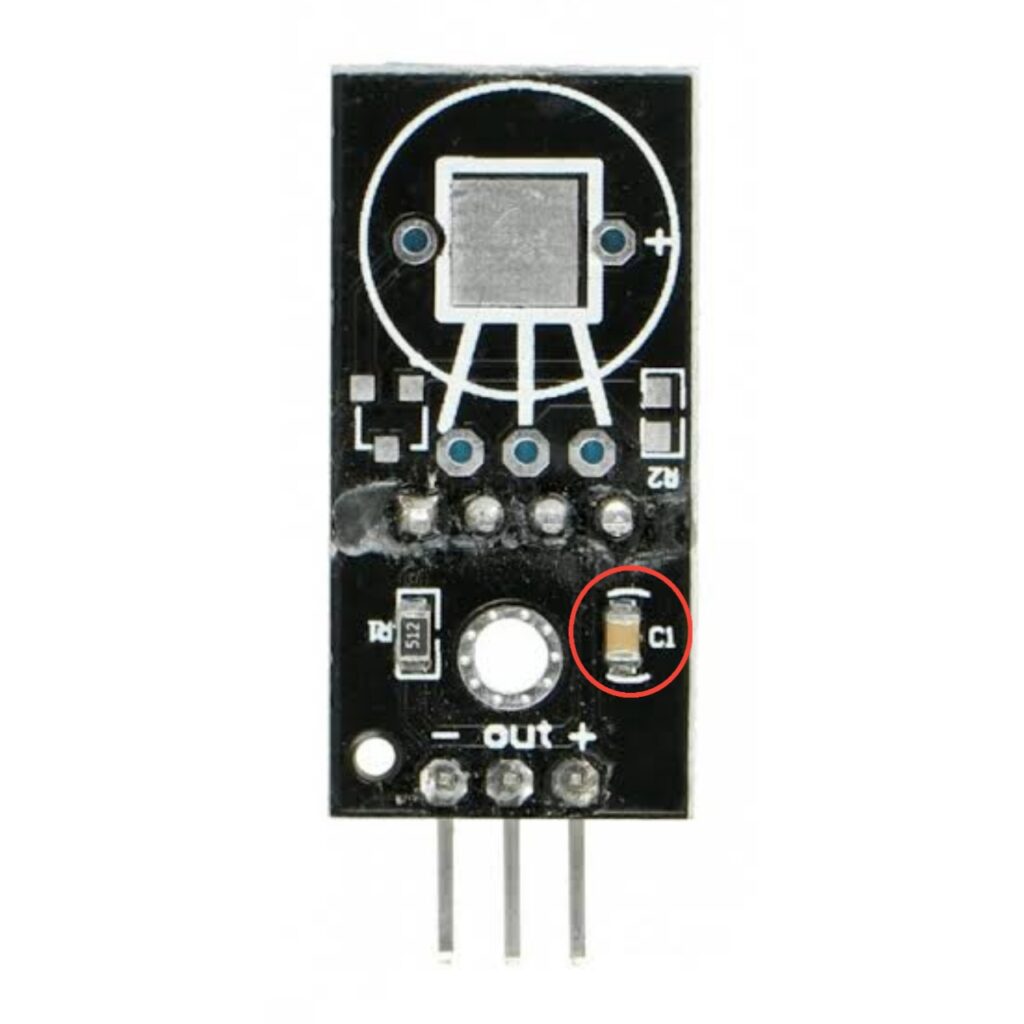 photo of a dht11 sensor module decoupling capacitor